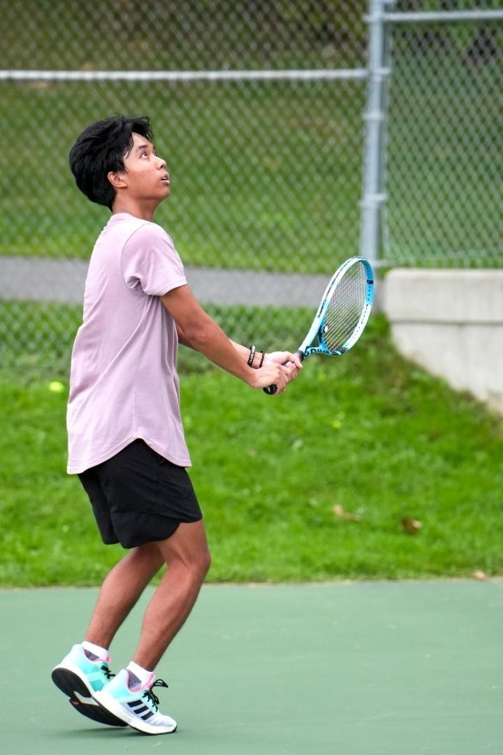 David playing tennis