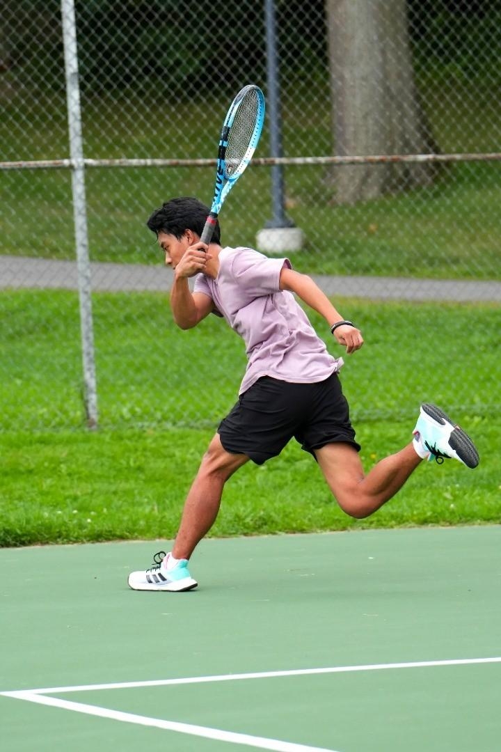 David playing tennis